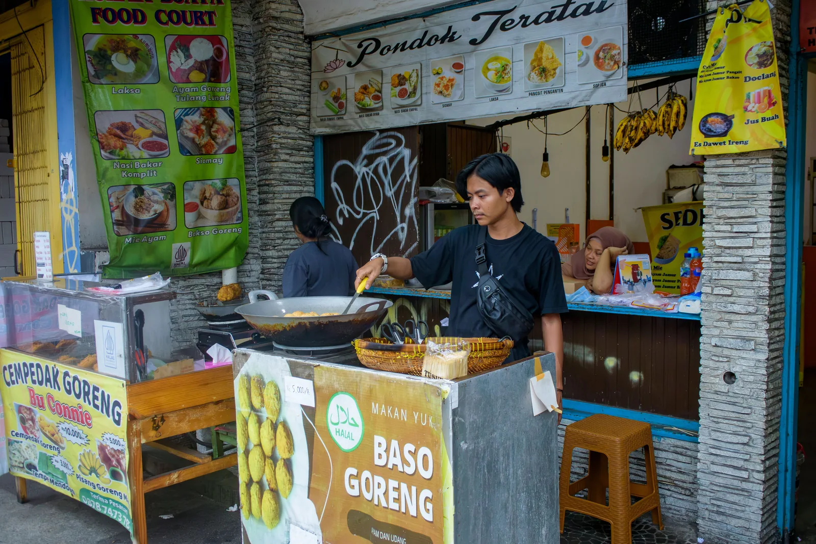 Halal street food stall selling bakso goreng in Indonesia