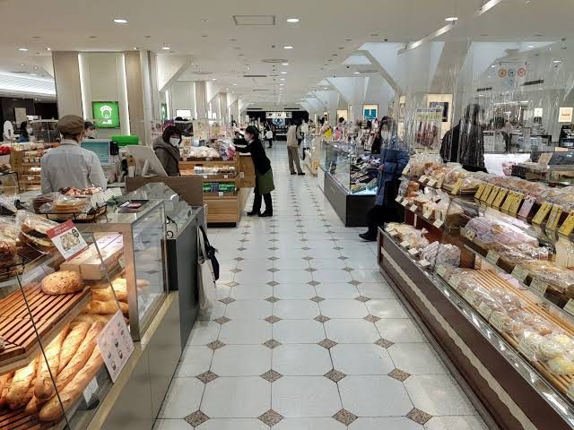 Tokyo department store basement food hall with labeled packaged products