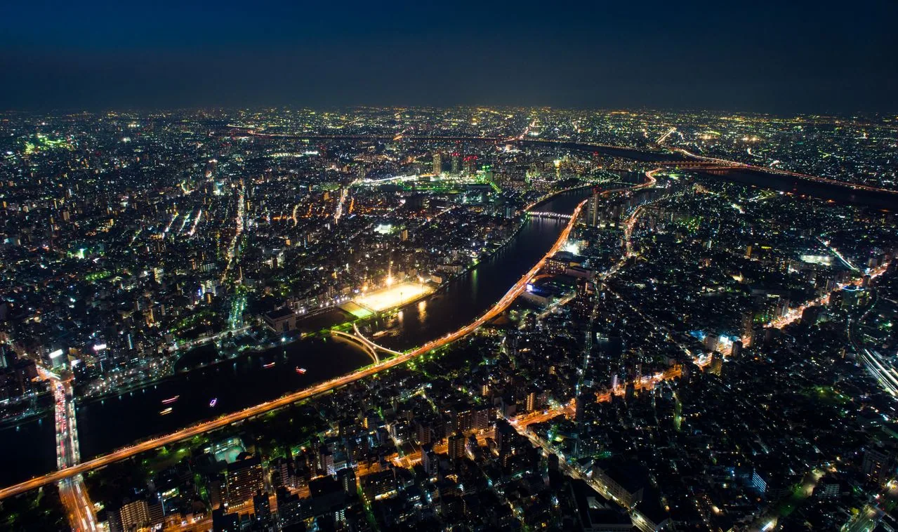 Tokyo's Shinjuku skyline at night: Japan food allergy travel hub