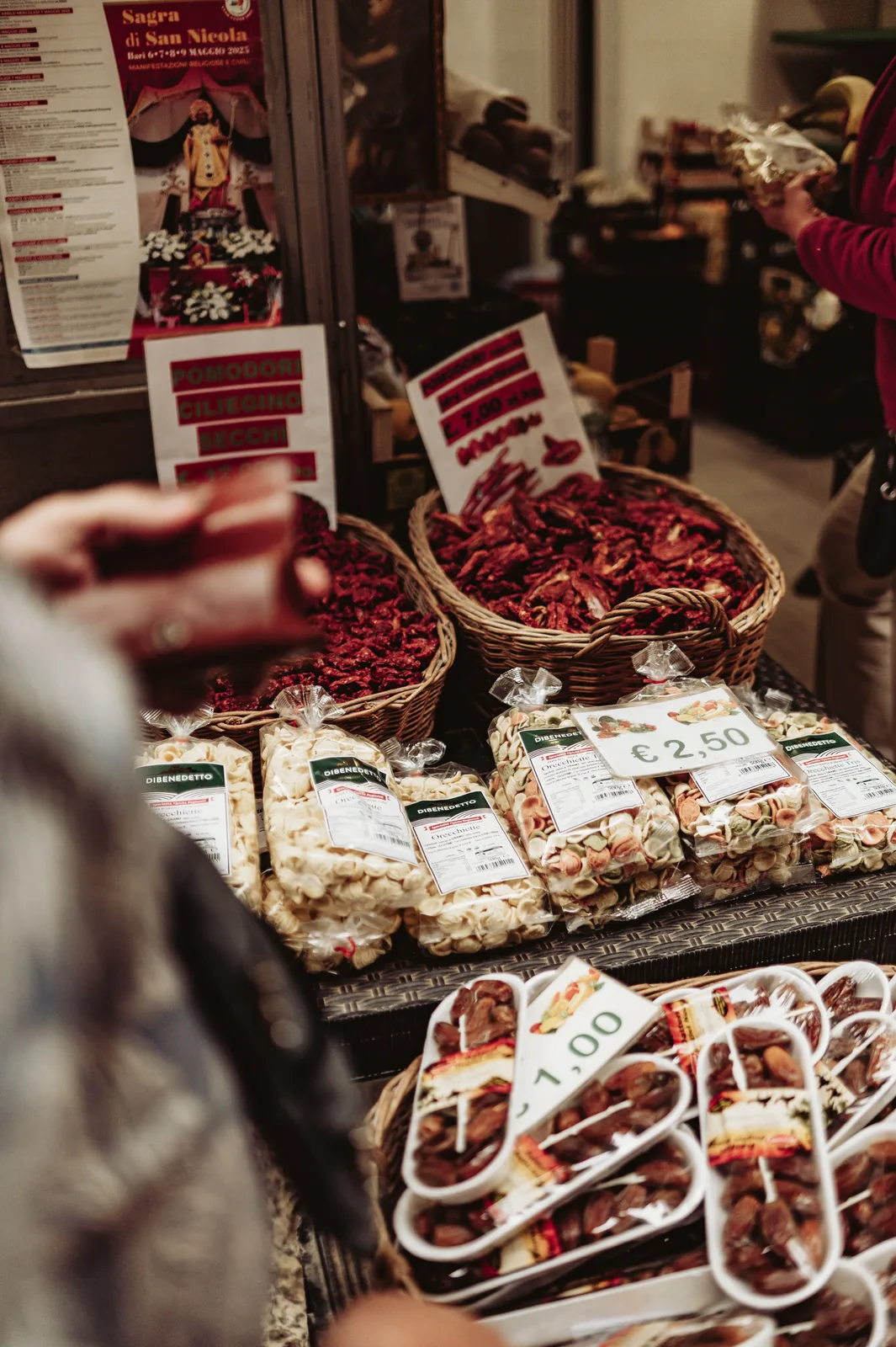 Baskets of dried fruit and nuts at a market stall