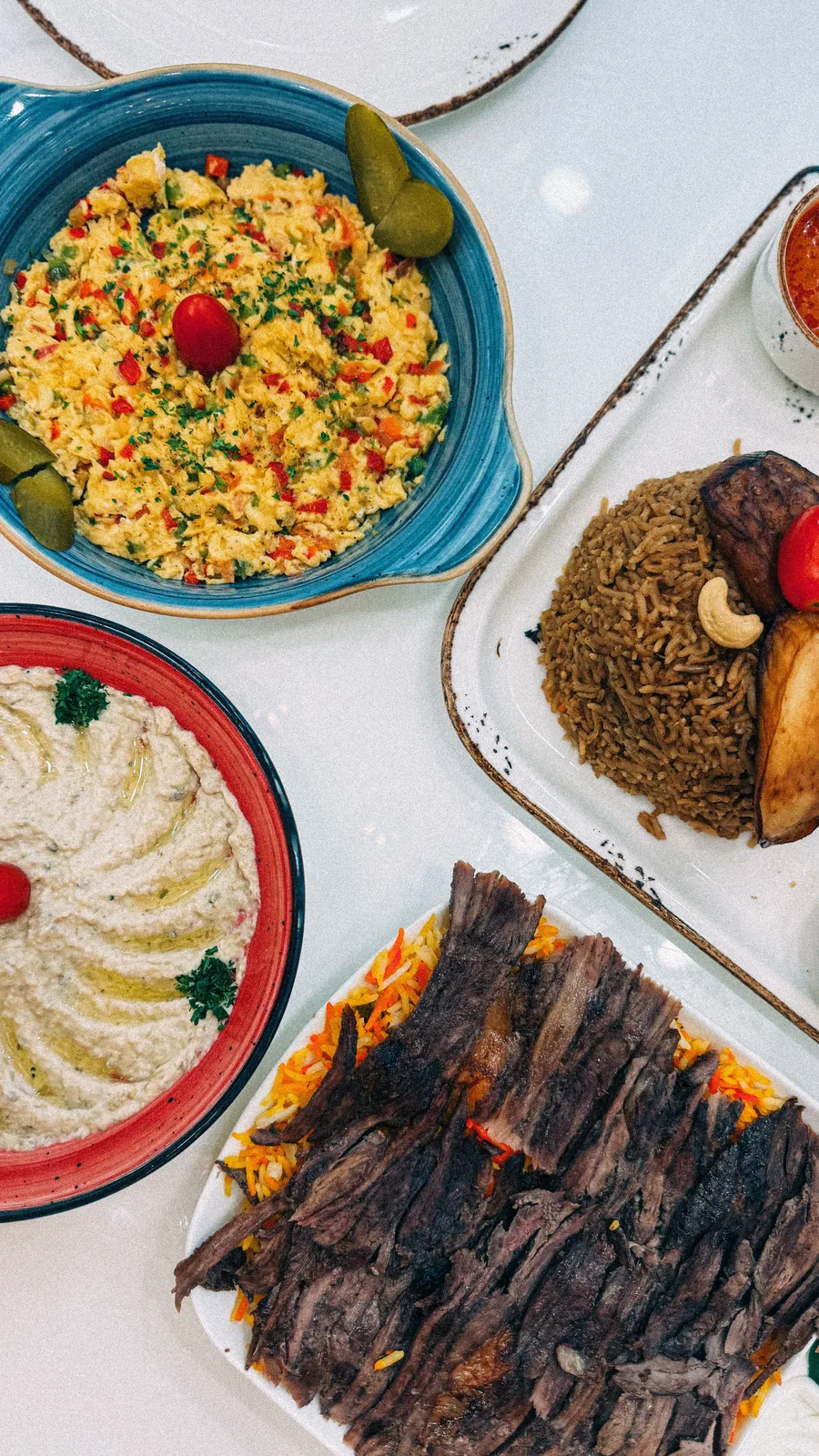 Middle Eastern dishes arranged on a table
