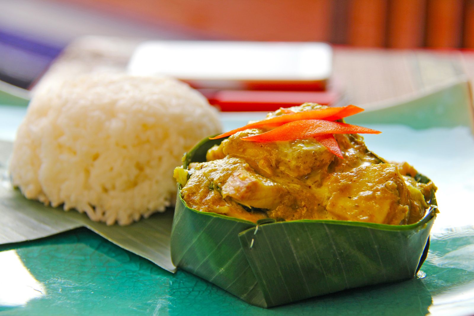 Cambodian fish amok curry, a traditional dish safe for many allergy travelers when prepared without garnish